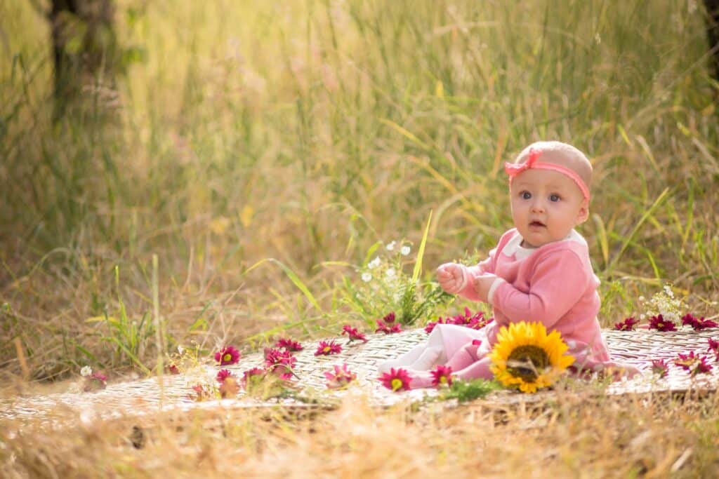 65+ Trendy Nature Girl Names That Celebrate Earth’s Beauty | Olivia has been the No. 1 most popular girl’s name in the United States every year since 2019. Babies baby girl outdoors sunflower