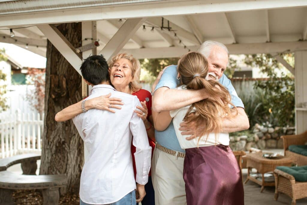 Simple yet meaningful ways kids can show appreciation on National Parents Day | Mark your calendars — because National Parents’ Day lands on Sunday, July 27. Parenting kids giving elderly parents a hug national parents day