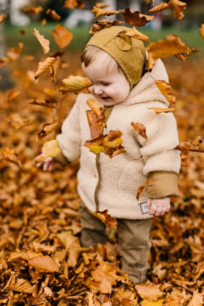 baby boy fall leaves
