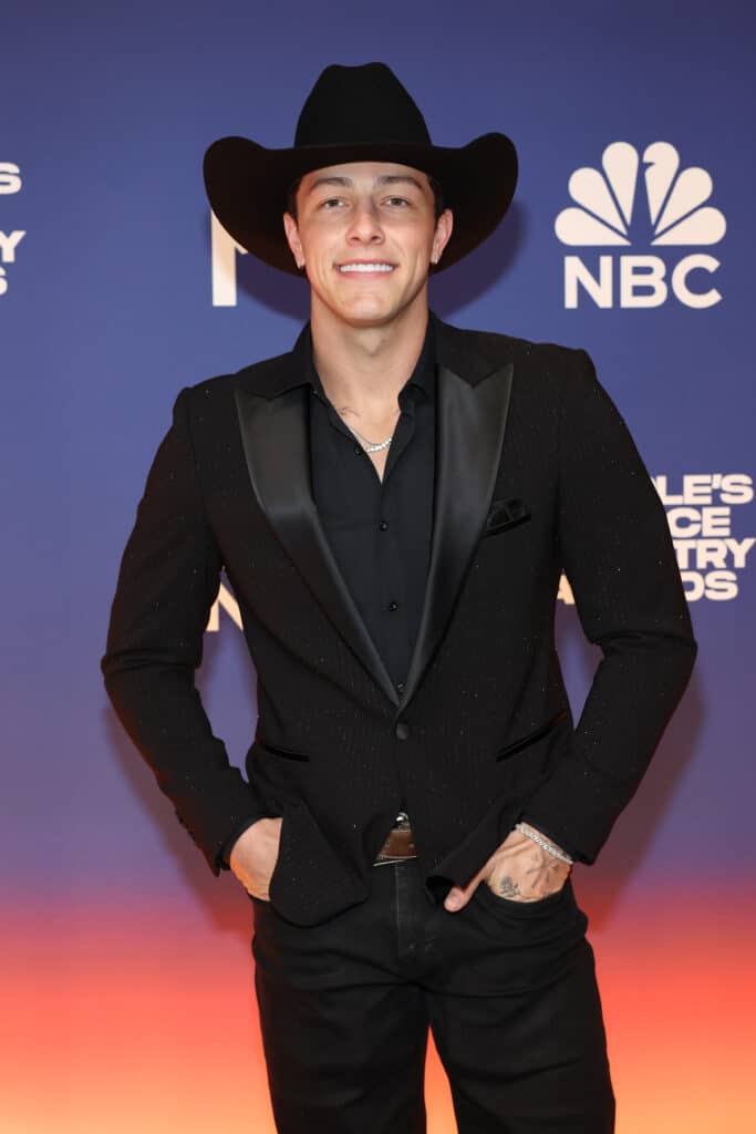 2174738605 country music star tayler holder shares video of him rushing into burning barn to save his animals