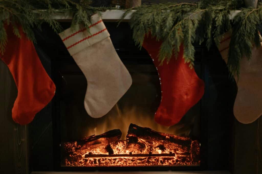 this family hangs 104 christmas stockings on one fireplace and the story behind it is beautiful