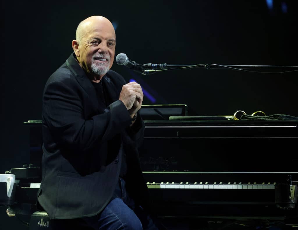 2183985178 billy joel sitting by piano at allegiant stadium