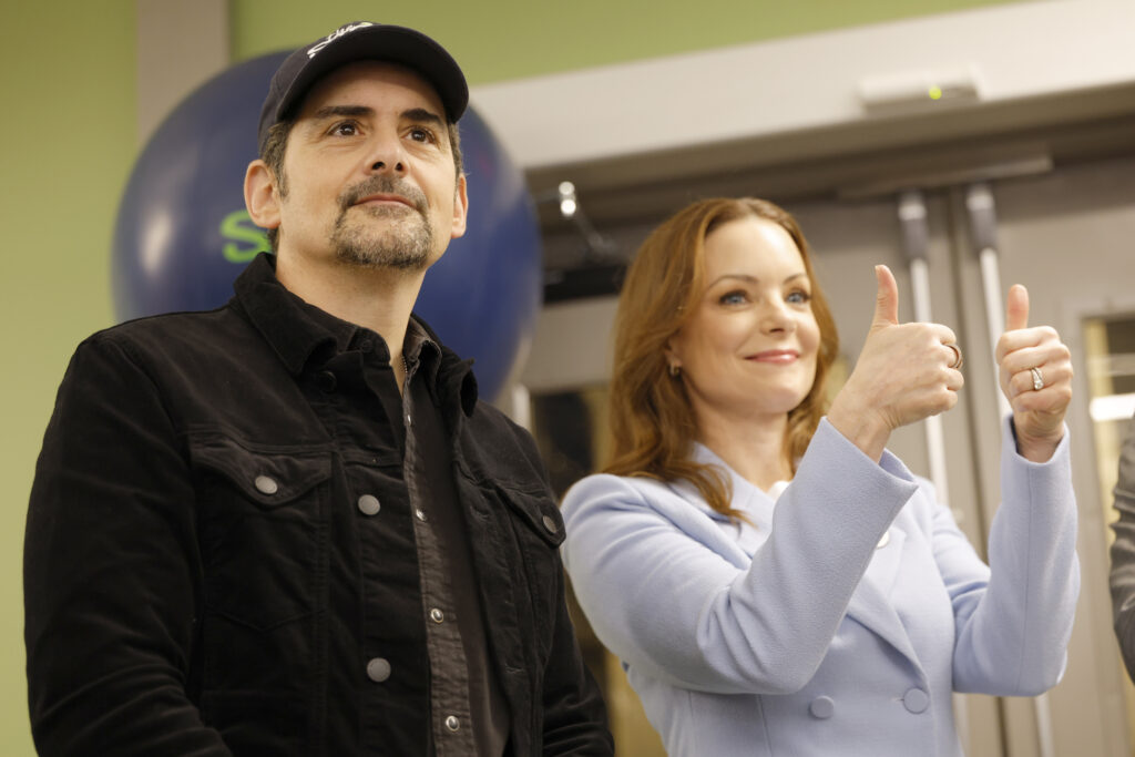2256277119 brad paisley and wife kimberly williams-paisley at opening of the store