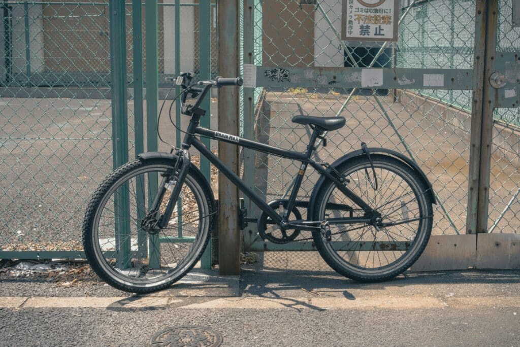 26 Nostalgic Sounds From Your Childhood That Kids Today May Never Hear Again 25 vintage bike by a fence nostalgic sounds