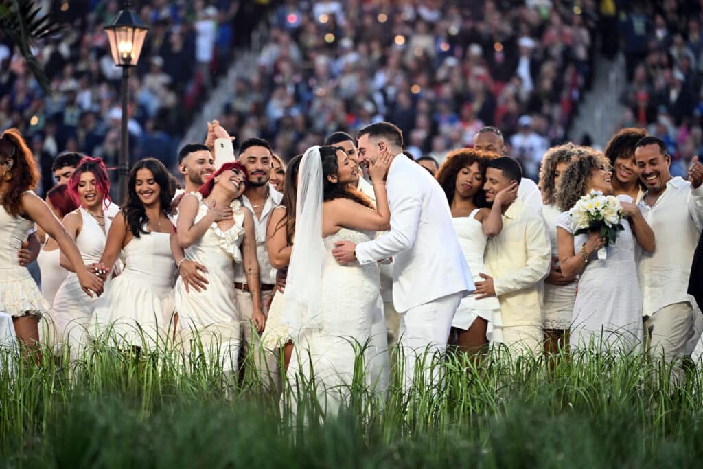 Inside Bad Bunny’s Historic Super Bowl Halftime Show: The Real Wedding, Tributes and Every Detail You Missed 1 Performers portray a wedding during Puerto Rican singer Bad Bunny performance at Super Bowl LX Patriots vs Seahawks Apple Music Halftime Show at Levi's Stadium in Santa Clara, California on February 8, 2026. (Photo by JOSH EDELSON / AFP via Getty Images)