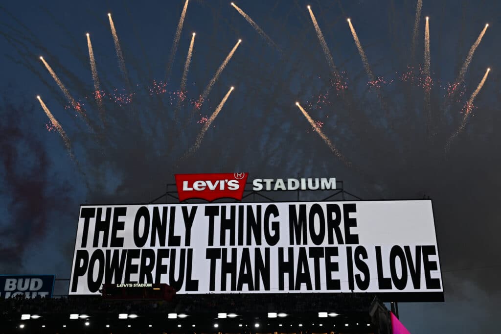 Inside Bad Bunny’s Historic Super Bowl Halftime Show: The Real Wedding, Tributes and Every Detail You Missed 4 TOPSHOT - A message is displayed while Puerto Rican singer Bad Bunny performs during the Super Bowl LX Patriots vs Seahawks Apple Music Halftime Show at Levi's Stadium in Santa Clara, California on February 8, 2026. (Photo by JOSH EDELSON / AFP via Getty Images)
