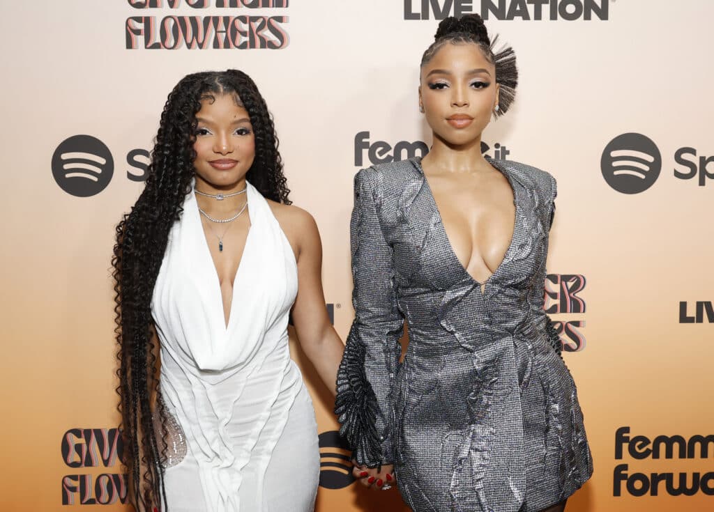 BEVERLY HILLS, CALIFORNIA - NOVEMBER 08: (L-R) Halle Bailey and Chloe Bailey attend the 3rd Annual Femme It Forward "Give Her FlowHERS" Awards Gala at The Beverly Hilton on November 08, 2024 in Beverly Hills, California. (Photo by Emma McIntyre/Getty Images)